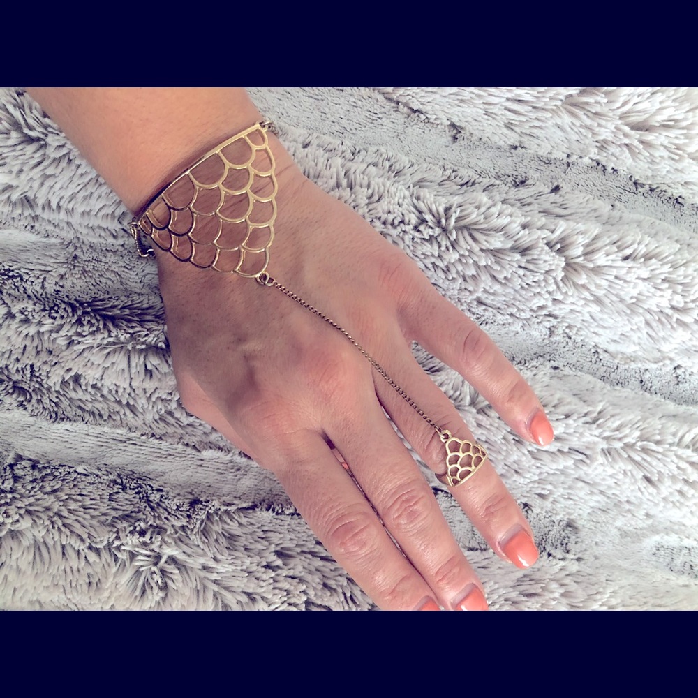 Gold bracelet with ring